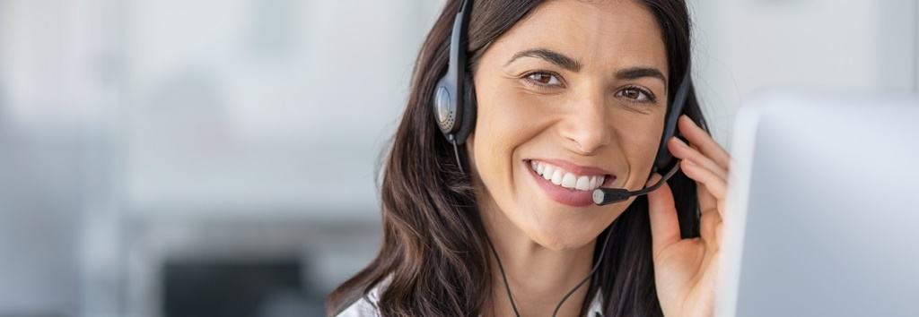 Happy smiling woman working in call center